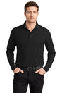 Male model wearing OGIO Caliber2.0 Long Sleeve OG105 polo in black, 5oz poly pique with stay-cool wicking, 3-button.