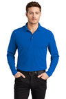 Blue OGIO Caliber2.0 Long Sleeve OG105 polo on model; 5 oz poly pique with stay-cool wicking, 3-button placket, flat knit collar.