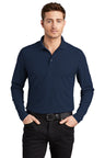 Male model in navy OGIO Caliber2.0 Long Sleeve OG105 polo with flat knit collar and 3-button placket.
